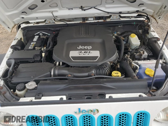 2012 Jeep Wrangler Unlimited Sport z VIN 1C4BJWDG9CL169159, wystawiony jako Copart lot #83647894 z przebiegiem 120 684 mil mil oraz Szkoda całkowita • Salvage title. Historia ofert i sprzedaży dostępna na DreamBid. Obrazek 12.