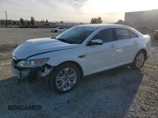 2010 Ford Taurus Limited with VIN 1FAHP2FW5AG116590, listed as a Copart auction lot 47821705 with 127,262 mi miles and Salvage title. Bid and sale history available at DreamBid. Image 1.