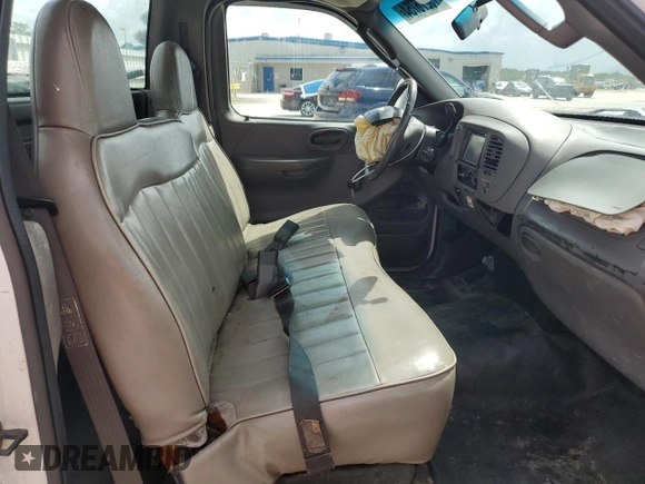 2002 Ford F-150 XL with VIN 1FTRF17W32NB86385, listed as a Copart auction lot 73276754 with 100,817 mi miles and Salvage Title. Bid and sale history available at carsss.com. Image 10.
