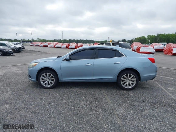 2013 Chevrolet Malibu LTZ with VIN 1G11H5SA2DU114542, listed as a IAAI auction lot 41441051 with 170,995 mi miles. Bid and sale history available at carsss.com. Image 14.