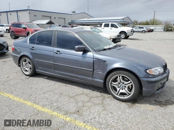 2003 BMW 3 Series 330i with VIN WBAEV53483KM03488, listed as a Copart auction lot 51610985 with 229,875 mi miles and Salvage Title. Bid and sale history available at carsss.com. Image 4.