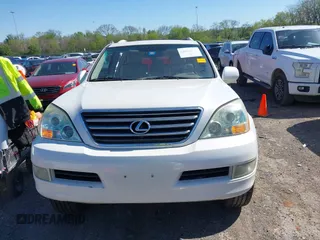 2007 Lexus GX with VIN JTJBT20X570145387, listed as a IAAI auction lot 42016545 with 153,907 mi miles and . Bid and sale history available at carsss.com. Image 12.