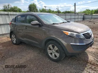 2012 Kia Sportage LX с VIN KNDPBCA22C7250958, выставлен на аукционе Copart как лот 56153275 с пробегом 133 412 миль миль и Чистый • Clean title. История ставок и продаж доступна на DreamBid. Изображение 4.