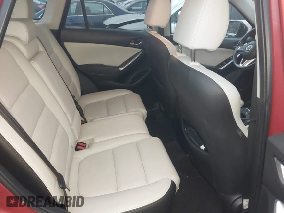 2016 Mazda CX-5 Grand Touring with VIN JM3KE4DY6G0740347, listed as a IAAI auction lot 41101437 with 81,586 mi miles. Bid and sale history available at carsss.com. Image 8.