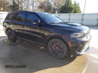 2023 Dodge Durango SRT 392 Premium with VIN 1C4SDJGJ8PC673452, listed as a Copart auction lot 83558234 with Not Provided miles and Clean Title. Bid and sale history available at DreamBid. Image 4.