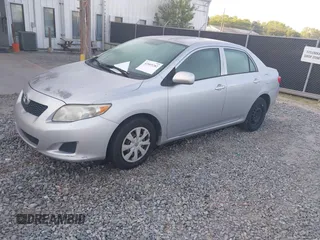 2010 Toyota Corolla with VIN 1NXBU4EE6AZ320115, listed as a IAAI auction lot 42069282 with 183,905 mi miles. Bid and sale history available at carsss.com. Image 2.