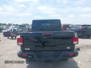 2022 Jeep Gladiator Willys Sport z VIN 1C6HJTAG7NL161701, wystawiony jako IAAI lot #42097144 z przebiegiem 32 989 mil mil oraz . Historia ofert i sprzedaży dostępna na DreamBid. Obrazek 17.