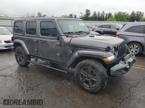 2020 Jeep Wrangler Unlimited Sahara Altitude with VIN 1C4HJXEM5LW293741, listed as a Copart auction lot 58801565 with 97,460 mi miles and Salvage title. Bid and sale history available at DreamBid. Image 4.