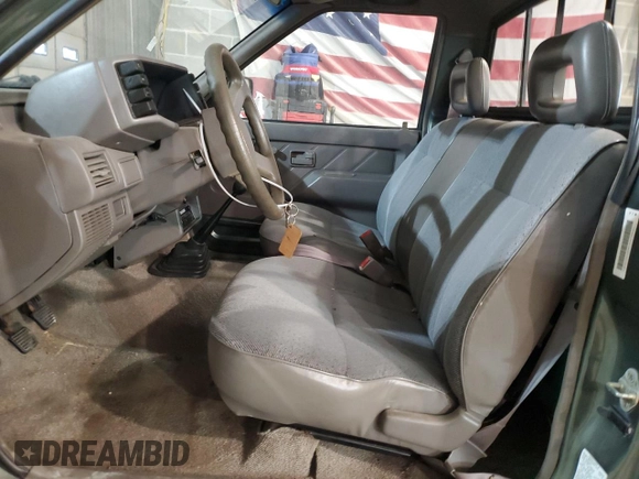 1995 Isuzu Pickup S z VIN JAACL11L0S7211543, wystawiony jako Copart lot #81881194 z przebiegiem 215 222 mil mil oraz Szkoda całkowita • Salvage title. Historia ofert i sprzedaży dostępna na DreamBid. Obrazek 7.