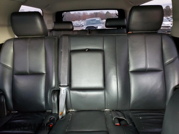 2014 Chevrolet Suburban LT with VIN 1GNSCJE01ER222961, listed as a Copart auction lot 84841744 with 168,131 mi miles and Salvage title. Bid and sale history available at DreamBid. Image 10.