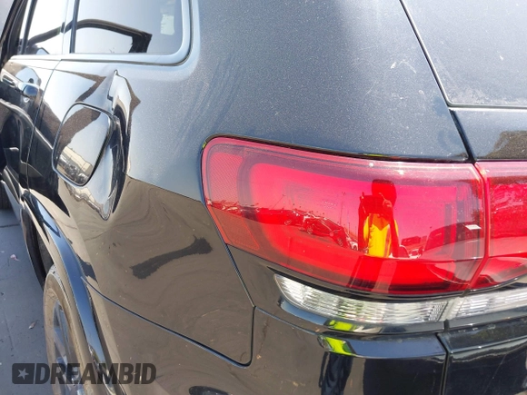 2019 Jeep Grand Cherokee Altitude with VIN 1C4RJFAG1KC845542, listed as a IAAI auction lot 42715201 with 62,461 mi miles and . Bid and sale history available at DreamBid. Image 6.