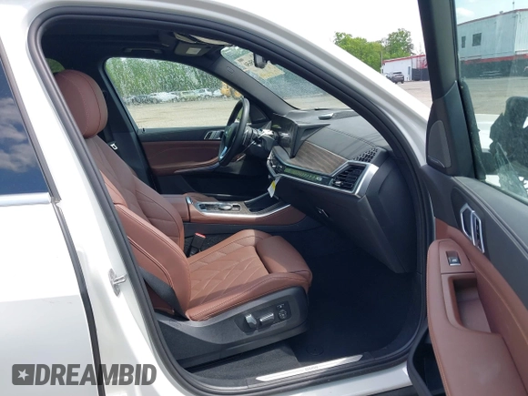 2024 BMW X5 xDrive40i with VIN 5UX23EU00R9V34355, listed as a IAAI auction lot 42135650 with 25,098 mi miles and . Bid and sale history available at DreamBid. Image 5.