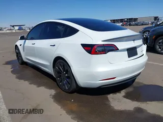 2023 Tesla Model 3 Performance z VIN 5YJ3E1EC7PF432748, wystawiony jako IAAI lot #41841913 z przebiegiem 36 043 mil mil oraz . Historia ofert i sprzedaży dostępna na DreamBid. Obrazek 3.