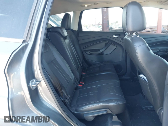 2013 Ford Escape Titanium with VIN 1FMCU0J95DUA29390, listed as a IAAI auction lot 42720269 with 147,413 mi miles and . Bid and sale history available at DreamBid. Image 8.