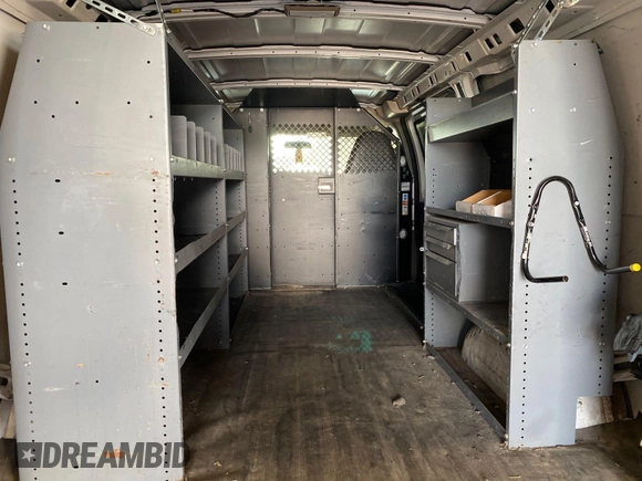 2014 Chevrolet Express Cargo with VIN 1GCWGFCA2E1184095, listed as a IAAI auction lot 42725036 with 270,636 mi miles and . Bid and sale history available at DreamBid. Image 31.