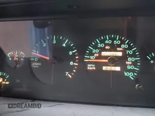 1995 Jeep Grand Cherokee Laredo with VIN 1J4GZ58S6SC765863, listed as a IAAI auction lot 41797726 with 234,715 mi miles and . Bid and sale history available at DreamBid. Image 7.