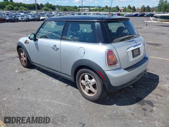2009 MINI Hardtop with VIN WMWMF335X9TU71767, listed as a IAAI auction lot 42696886 with 105,408 mi miles and . Bid and sale history available at DreamBid. Image 3.