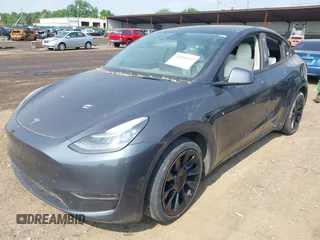 2021 Tesla Model Y Long Range z VIN 5YJYGDEE7MF140144, wystawiony jako IAAI lot #42350137 z przebiegiem Nie podano mil oraz . Historia ofert i sprzedaży dostępna na DreamBid. Obrazek 2.