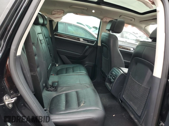 2016 Volkswagen Touareg Sport with VIN WVGEF9BP4GD011455, listed as a Copart auction lot 49734885 with 145,450 mi miles and Salvage Title. Bid and sale history available at DreamBid. Image 11.