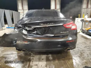 2017 Maserati Quattroporte z VIN ZAM56RRL4H1217395, wystawiony jako Copart lot #83762004 z przebiegiem 41 409 mil mil oraz Szkoda całkowita • Salvage title. Historia ofert i sprzedaży dostępna na DreamBid. Obrazek 6.