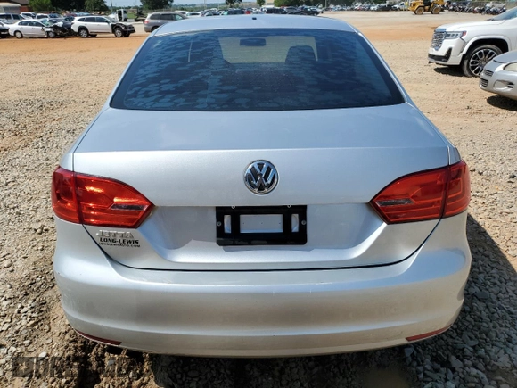 2014 Volkswagen Jetta S with VIN 3VW2K7AJ1EM289975, listed as a Copart auction lot 65003635 with 135,286 mi miles and Clean title. Bid and sale history available at DreamBid. Image 6.