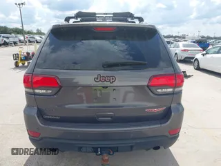 2018 Jeep Grand Cherokee Trailhawk with VIN 1C4RJFLG8JC427345, listed as a IAAI auction lot 41557222 with 49,469 mi miles and . Bid and sale history available at DreamBid. Image 16.
