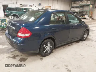 2009 Nissan Versa 1.8 S with VIN 3N1BC11E79L440560, listed as a IAAI auction lot 41975289 with 158,726 mi miles. Bid and sale history available at carsss.com. Image 4.