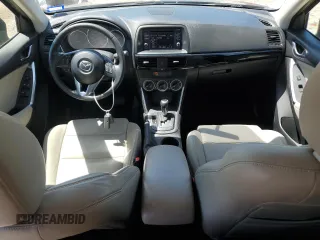 2014 Mazda CX-5 Touring with VIN JM3KE2CY7E0362879, listed as a Copart auction lot 53079545 with 70,863 mi miles and Salvage Title. Bid and sale history available at carsss.com. Image 8.
