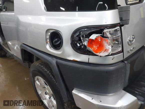 2007 Toyota FJ Cruiser with VIN JTEBU11F470035202, listed as a IAAI auction lot 41972066 with 241,021 mi miles. Bid and sale history available at carsss.com. Image 6.