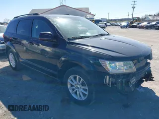 2016 Dodge Journey SXT with VIN 3C4PDCBGXGT123087, listed as a IAAI auction lot 41869667 with 256,583 mi miles. Bid and sale history available at carsss.com. Image 1.