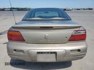 1999 Chrysler Sebring LXi with VIN 4C3AU52N1XE071836, listed as a Copart auction lot 54136735 with 151,531 mi miles and Salvage Title. Bid and sale history available at DreamBid. Image 6.