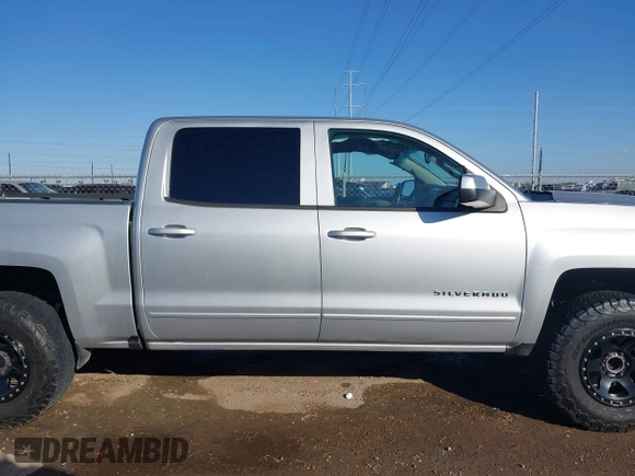 2018 Chevrolet Silverado 1500 LT with VIN 3GCPCREC9JG574686, listed as a IAAI auction lot 41676124 with 74,239 mi miles and . Bid and sale history available at DreamBid. Image 13.