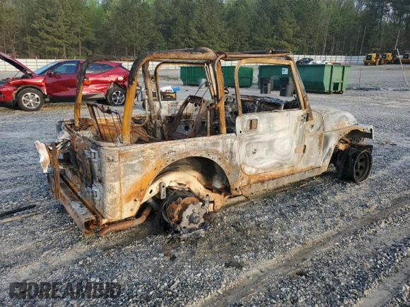 2004 Jeep Wrangler Rubicon with VIN 1J4FA69S54P710341, listed as a Copart auction lot 51749175 with Not provided miles and Non repairable. Bid and sale history available at DreamBid. Image 3.