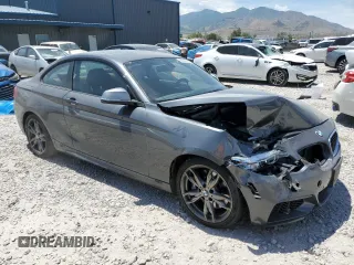 2015 BMW 2 Series M235i with VIN WBA1J7C55FV253647, listed as a Copart auction lot 60231395 with 57,639 mi miles and Salvage title. Bid and sale history available at DreamBid. Image 4.