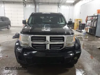 2007 Dodge Nitro SLT with VIN 1D8GT58K77W724530, listed as a IAAI auction lot 41499022 with 214,183 mi miles. Bid and sale history available at carsss.com. Image 12.
