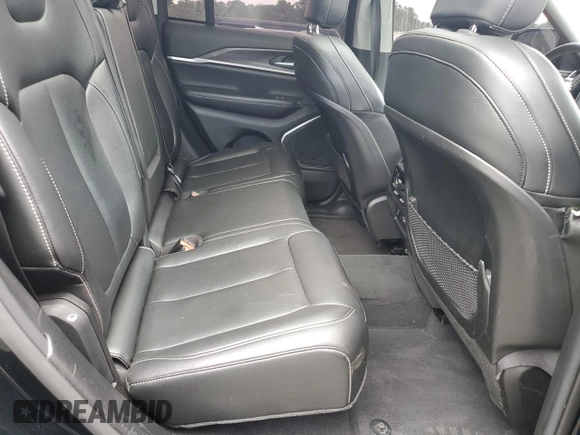 2023 Jeep Grand Cherokee с VIN 1C4RJYB61PC649593, выставлен на аукционе Copart как лот 65001865 с пробегом Не указан миль и На запчасти • Non repairable. История ставок и продаж доступна на DreamBid. Изображение 11.