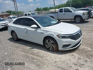 2021 Volkswagen Jetta SEL Premium z VIN 3VWG57BU5MM065550, wystawiony jako IAAI lot #42424305 z przebiegiem 59 083 mil mil oraz . Historia ofert i sprzedaży dostępna na DreamBid. Obrazek 1.