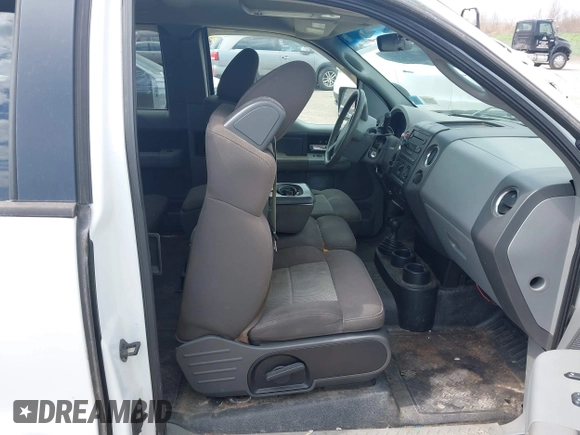 2006 Ford F-150 STX with VIN 1FTRX14W36FB55882, listed as a IAAI auction lot 42113485 with 126,492 mi miles. Bid and sale history available at carsss.com. Image 5.