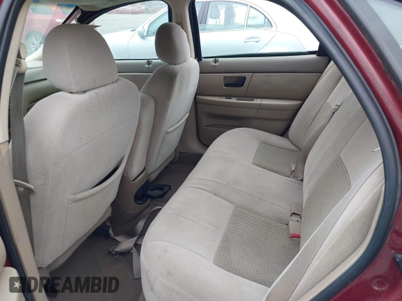 2004 Ford Taurus SE with VIN 1FAFP53214G150248, listed as a IAAI auction lot 41543177 with 99,553 mi miles and . Bid and sale history available at DreamBid. Image 8.