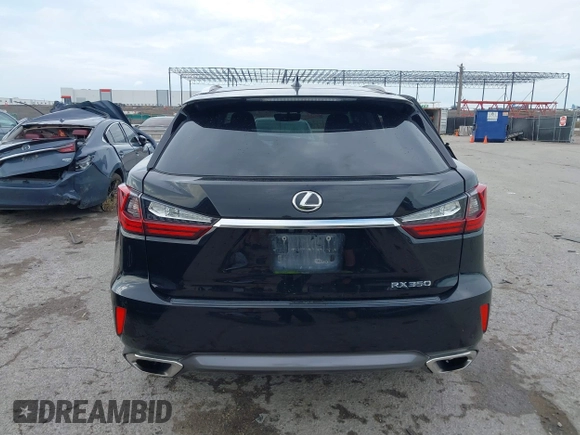 2016 Lexus RX 350 z VIN 2T2BZMCA4GC017342, wystawiony jako IAAI lot #42357093 z przebiegiem 142 515 mil mil oraz . Historia ofert i sprzedaży dostępna na DreamBid. Obrazek 16.
