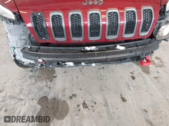 2016 Jeep Cherokee Trailhawk with VIN 1C4PJMBBXGW135138, listed as a IAAI auction lot 41595718 with 267,058 mi miles and . Bid and sale history available at DreamBid. Image 6.