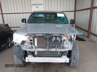 2014 Toyota Tacoma with VIN 3TMLU4EN3EM162738, listed as a IAAI auction lot 41871226 with 135,318 mi miles and . Bid and sale history available at DreamBid. Image 13.