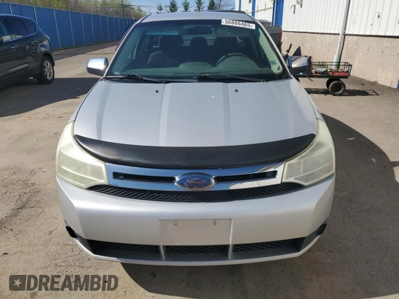 2009 Ford Focus SE z VIN 1FAHP35N29W126266, wystawiony jako Copart lot #56886465 z przebiegiem 420 672 mil mil oraz Czysty tytuł • Clean title. Historia ofert i sprzedaży dostępna na DreamBid. Obrazek 5.