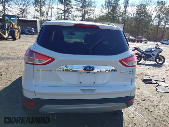 2014 Ford Escape Titanium with VIN 1FMCU9JX7EUD17335, listed as a IAAI auction lot 41302107 with 104,352 mi miles and . Bid and sale history available at DreamBid. Image 15.