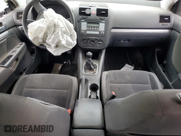2009 Volkswagen Jetta S with VIN 3VWJM71K69M035974, listed as a Copart auction lot 56979765 with Not provided miles and Salvage title. Bid and sale history available at DreamBid. Image 8.