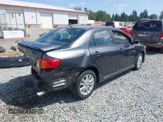 2010 Toyota Corolla with VIN 1NXBU4EE1AZ324038, listed as a IAAI auction lot 42488922 with 141,822 mi miles and . Bid and sale history available at DreamBid. Image 4.