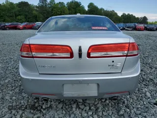 2012 Lincoln MKZ z VIN 3LNHL2GC4CR804632, wystawiony jako Copart lot #55783535 z przebiegiem 148 036 mil mil oraz Szkoda całkowita • Salvage title. Historia ofert i sprzedaży dostępna na DreamBid. Obrazek 6.