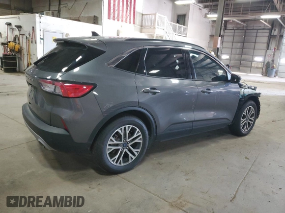 2021 Ford Escape SEL z VIN 1FMCU0H66MUB04206, wystawiony jako Copart lot #56638585 z przebiegiem Nie podano mil oraz Szkoda całkowita • Salvage title. Historia ofert i sprzedaży dostępna na DreamBid. Obrazek 3.