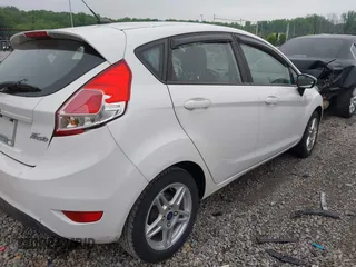2017 Ford Fiesta SE z VIN 3FADP4EJ5HM117593, wystawiony jako IAAI lot #42212555 z przebiegiem 122 850 mil mil oraz . Historia ofert i sprzedaży dostępna na DreamBid. Obrazek 4.