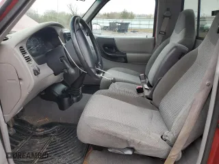 1999 Mazda B-Series 2WD Truck SX with VIN 4F4YR12C2XTM08473, listed as a Copart auction lot 52577185 with 173,620 mi miles and Salvage Title. Bid and sale history available at carsss.com. Image 7.